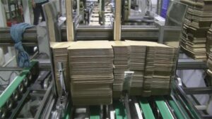 Custom Sleeve Boxes: Tray Fit, Friction and Cost Guide (2026) 2 glue the box by machine