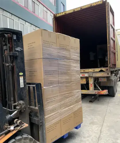 Blog 12 Loading a container of custom bags and boxces